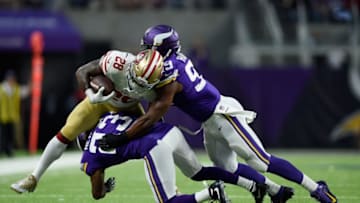MINNEAPOLIS, MN - AUGUST 27: Carlos Hyde #28 of the San Francisco 49ers is tackled by Terence Newman #23 and Danielle Hunter #99 of the Minnesota Vikings during the first quarter in the preseason game on August 27, 2017 at U.S. Bank Stadium in Minneapolis, Minnesota. (Photo by Hannah Foslien/Getty Images)