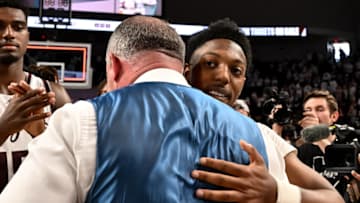 Mar 4, 2023; College Station, Texas, USA; Texas A&M Aggies head coach Buzz Williams and guard Wade Taylor IV (4) embrace after defeating the Alabama Crimson Tide at Reed Arena. Mandatory Credit: Maria Lysaker-USA TODAY Sports