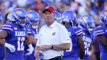 LAWRENCE, KANSAS - SEPTEMBER 1: Head coach Lance Leipold of the Kansas Jayhawks watches his team warm up prior to a game against the Missouri State Bears at David Booth Kansas Memorial Stadium on September 1, 2023 in Lawrence, Kansas. (Photo by Ed Zurga/Getty Images)