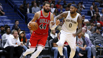 NEW ORLEANS, LA - OCTOBER 03: Nikola Mirotic #44 of the Chicago Bulls drives against DeMarcus Cousins #0 of the New Orleans Pelicans during a preseason game at the Smoothie King Center on October 3, 2017 in New Orleans, Louisiana. NOTE TO USER: User expressly acknowledges and agrees that, by downloading and or using this Photograph, user is consenting to the terms and conditions of the Getty Images License Agreement. (Photo by Jonathan Bachman/Getty Images)
