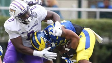Auburn footballJames Madison defensive lineman Isaac Ukwu stops Delaware running back Quincy Watson in the first quarter at Delaware Stadium, Saturday, Oct. 23, 2021.Ud V Jmu