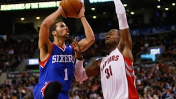 Apr 9, 2014; Toronto, Ontario, CAN; Philadelphia 76ers guard Michael Carter-Williams (1) goes to make a basket as Toronto Raptors guard Terrence Ross (31) defends at the Air Canada Centre. Toronto defeated Philadelphia 125-114. Mandatory Credit: John E. Sokolowski-USA TODAY Sports