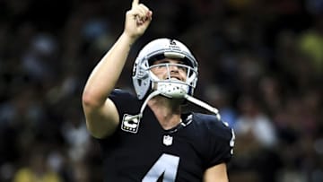 Sep 11, 2016; New Orleans, LA, USA; Oakland Raiders quarterback Derek Carr (4) celebrates after completing a two point conversion to take the lead during the fourth quarter of a game against the New Orleans Saints at the Mercedes-Benz Superdome. The Raiders defeated the Saints 35-34. Mandatory Credit: Derick E. Hingle-USA TODAY Sports