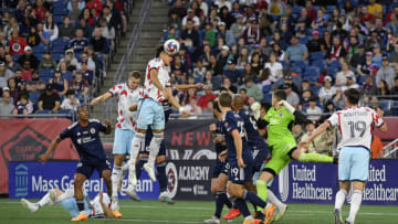 May 27, 2023; Foxborough, Massachusetts, USA; Chicago Fire defender Kendall Burks (27) heads the ball against the New England Revolution during the first half at Gillette Stadium. Mandatory Credit: Bob DeChiara-USA TODAY Sports