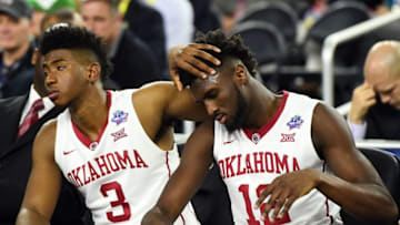 Apr 2, 2016; Houston, TX, USA; Oklahoma Sooners guard Christian James (3) and forward Khadeem Lattin (12) react on the bench during the second half against the Villanova Wildcats in the 2016 NCAA Men