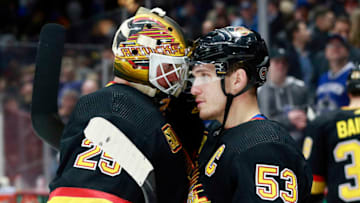 VANCOUVER, BC - FEBRUARY 10: Bo Horvat #53 of the Vancouver Canucks congratulates teammate Jacob Markstrom #25 after winning their NHL game against the Nashville Predators at Rogers Arena February 10, 2020 in Vancouver, British Columbia, Canada. Vancouver won 6-2. (Photo by Jeff Vinnick/NHLI via Getty Images)