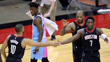 Eric Gordon #10 of the Houston Rockets slaps hands with Victor Oladipo #7 during the second quarter against the Miami Heat(Photo by Carmen Mandato/Getty Images)