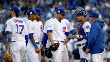 CHICAGO, IL - OCTOBER 09: Manager Joe Maddon of the Chicago Cubs relieves Jose Quintana(Photo by Jonathan Daniel/Getty Images)