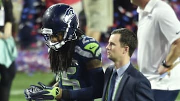 Feb 1, 2015; Glendale, AZ, USA; Seattle Seahawks cornerback Richard Sherman (25) walks off the field after the game against the New England Patriots in Super Bowl XLIX at University of Phoenix Stadium. The Patriots defeated the Seahawks 28-24. Mandatory Credit: Joe Camporeale-USA TODAY Sports