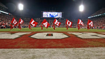 NORMAN, OK - OCTOBER 28: Members of the Oklahoma Sooners spirit squad celebrate a touchdown against the Texas Tech Red Raiders at Gaylord Family Oklahoma Memorial Stadium on October 28, 2017 in Norman, Oklahoma. Oklahoma defeated Texas Tech 49-27. (Photo by Brett Deering/Getty Images) *** Local Caption ***