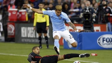 May 8, 2016; Washington, DC, USA; D.C. United forward Alvaro Saborio (9) attempts a tackle on New York City FC defender Ronald Matarrita (22) in the first half at Robert F. Kennedy Memorial Stadium. Mandatory Credit: Geoff Burke-USA TODAY Sports