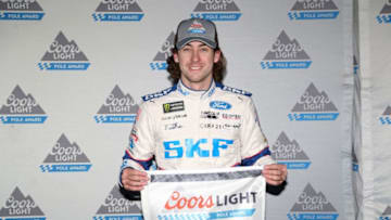 AVONDALE, AZ - NOVEMBER 10: Ryan Blaney, driver of the #21 SKF/Quick Lane Tire & Auto Center Ford, poses with the Coors Light Pole Award after qualifying for the Monster Engergy NASCAR Cup Series Can-Am 500 at Phoenix International Raceway on November 10, 2017 in Avondale, Arizona. (Photo by Matt Sullivan/Getty Images)