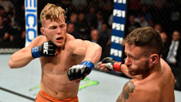 LAS VEGAS, NV - JULY 06: (L-R) Brad Katona of Canada punches Jay Cucciniello of Ireland in their featherweight bout during The Ultimate Fighter Finale event inside The Pearl concert theater at Palms Casino Resort on July 6, 2018 in Las Vegas, Nevada. (Photo by Jeff Bottari/Zuffa LLC/Zuffa LLC via Getty Images)