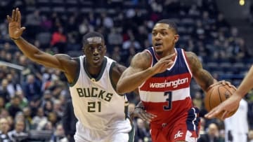 Jan 8, 2017; Milwaukee, WI, USA; Washington Wizards guard Bradley Beal (3) drives for the basket between Milwaukee Bucks guard Tony Snell (21) in the first quarter at BMO Harris Bradley Center. Mandatory Credit: Benny Sieu-USA TODAY Sports