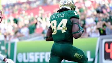 Tampa, FL - SEPT 1: Randall St. Felix #84 of the South Florida Bulls catches a touchdown pass in the first quarter of a football game against the Elon Phoenix on September 1, 2018 at Raymond James Stadium in Tampa, Florida. (Photo by (Photo by Julio Aguilar/Getty Images)