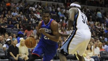 Apr 11, 2014; Memphis, TN, USA; Philadelphia 76ers forward Thaddeus Young (21) drives to the basket against Memphis Grizzlies forward Zach Randolph (50) during the game at FedExForum. Memphis Grizzlies beat Philadelphia 76ers 117 - 95. Mandatory Credit: Justin Ford-USA TODAY Sports