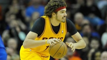 Dec 29, 2013; Cleveland, OH, USA; Cleveland Cavaliers center Anderson Varejao (17) dribbles during a game against the Golden State Warriors at Quicken Loans Arena. The Warriors won 108-104. Mandatory Credit: David Richard-USA TODAY Sports