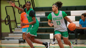 December 6, 2021; Chandler, AZ; AZ Compass Prep varsity basketball player, junior, Kylan Boswell, 23, and junior, Mookie Cook, 1, practice at the AZ Compass Prep gymnasium the week of the Hoophall West tournamentAz Compass Basketball