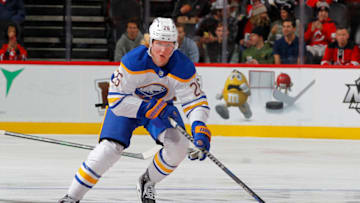 NEWARK, NEW JERSEY - OCTOBER 23: Rasmus Dahlin #26 of the Buffalo Sabres in action against the New Jersey Devils at Prudential Center on October 23, 2021 in Newark, New Jersey. The Devils defeated the Sabres 2-1 in overtime. (Photo by Jim McIsaac/Getty Images)