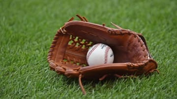 Oct 9, 2015; Kansas City, MO, USA; A general view of a ball and glove on the field before the Kansas City Royals and the Houston Astros play in game two of the ALDS at Kauffman Stadium. Mandatory Credit: Peter G. Aiken-USA TODAY Sports