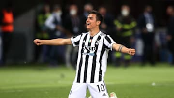 BOLOGNA, ITALY - MAY 23: Paulo Dybala of Juventus celebrates after news of results from elsewhere confirmed the club's qualification for the UEFA Champions League following the Serie A match between Bologna FC and Juventus at Stadio Renato Dall'Ara on May 23, 2021 in Bologna, Italy. (Photo by Jonathan Moscrop/Getty Images)