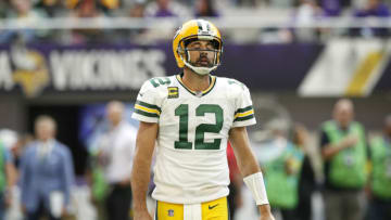 MINNEAPOLIS, MINNESOTA - SEPTEMBER 11: Aaron Rodgers #12 of the Green Bay Packers reacts after a play during the second quarter in the game against the Minnesota Vikings at U.S. Bank Stadium on September 11, 2022 in Minneapolis, Minnesota. (Photo by David Berding/Getty Images)