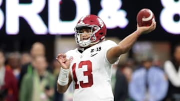 ATLANTA, GA - JANUARY 08: Tua Tagovailoa #13 of the Alabama Crimson Tide throws a pass during the second half against the Georgia Bulldogs in the CFP National Championship presented by AT&T at Mercedes-Benz Stadium on January 8, 2018 in Atlanta, Georgia. (Photo by Streeter Lecka/Getty Images)