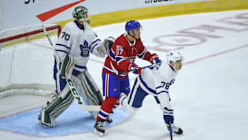 TORONTO, ON - SEPTEMBER 08: Montreal Canadiens Forward Antoine Waked (97) and Toronto Maple Leafs Defenceman Timothy Liljegren (78) fight for position in front of Toronto Maple Leafs Goalie Ian Scott (70) during the preseason Rookie Tournament game between the Toronto Maple Leafs and Montreal Canadiens on September 08, 2017 at Ricoh Coliseum in Toronto, ON. (Photo by Gerry Angus/Icon Sportswire via Getty Images)