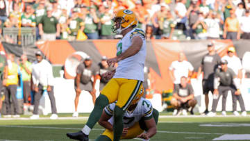 CINCINNATI, OHIO - OCTOBER 10: Mason Crosby #2 of the Green Bay Packers kicks a field goal to the Cincinnati Bengals 25-22 in overtime at Paul Brown Stadium on October 10, 2021 in Cincinnati, Ohio. (Photo by Dylan Buell/Getty Images)