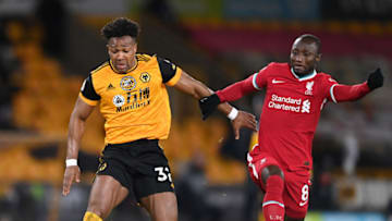 Adama Traore of Wolverhampton Wanderers on the ball whilst under pressure from Naby Keita of Liverpool. (Photo by Laurence Griffiths/Getty Images)