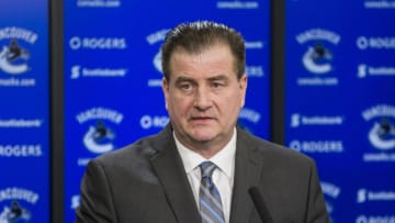 VANCOUVER, BC - FEBRUARY 28: Vancouver Canucks General Manager Jim Benning speaks to the media after a game between against the Vancouver Canucks and Detroit Red Wings. Benning was discussing the recent trades of Vancouver Canucks Left Wing Alexandre Burrows (14) and Vancouver Canucks Right Wing Jannik Hansen (36). February 28, 2017, at Rogers Arena in Vancouver, BC. (Photo by Bob Frid/Icon Sportswire via Getty Images)