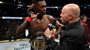 LAS VEGAS, NEVADA - MARCH 07: Israel Adesanya of Nigeria is interviewed after defeating Yoel Romero of Cuba in their UFC middleweight championship fight during the UFC 248 event at T-Mobile Arena on March 07, 2020 in Las Vegas, Nevada. (Photo by Jeff Bottari/Zuffa LLC)