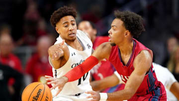 Cincinnati Bearcats guard Rob Phinisee during game at Fifth Third Arena. The Enquirer.