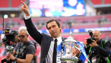 LONDON, ENGLAND - MAY 19: Antonio Conte, Manager of Chelsea celebrates with the Emirates FA Cup Trophy following his sides victory in The Emirates FA Cup Final between Chelsea and Manchester United at Wembley Stadium on May 19, 2018 in London, England. (Photo by Laurence Griffiths/Getty Images)