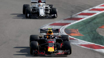 SOCHI, RUSSIA - SEPTEMBER 30: Max Verstappen of the Netherlands driving the (33) Aston Martin Red Bull Racing RB14 TAG Heuer leads Charles Leclerc of Monaco driving the (16) Alfa Romeo Sauber F1 Team C37 Ferrari on track during the Formula One Grand Prix of Russia at Sochi Autodrom on September 30, 2018 in Sochi, Russia. (Photo by Charles Coates/Getty Images)