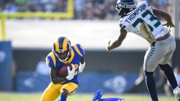 LOS ANGELES, CA - NOVEMBER 11: Wide receiver Brandin Cooks #12 of the Los Angeles Rams runs after his catch in the second quarter against the Seattle Seahawks at Los Angeles Memorial Coliseum on November 11, 2018 in Los Angeles, California. (Photo by Harry How/Getty Images)
