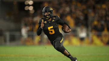 TEMPE, AZ - SEPTEMBER 08: Quarterback Manny Wilkins #5 of the Arizona State Sun Devils scrambles with the football against the Michigan State Spartans during the second half of the college football game at Sun Devil Stadium on September 8, 2018 in Tempe, Arizona. The Sun Devils defeated the Spartans 16-13. (Photo by Christian Petersen/Getty Images)