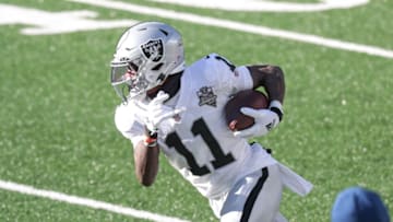 Dec 6, 2020; East Rutherford, New Jersey, USA; Las Vegas Raiders wide receiver Henry Ruggs III (11) gains yards after catch during the first half against the New York Jets at MetLife Stadium. Mandatory Credit: Vincent Carchietta-USA TODAY Sports