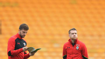 NORWICH, ENGLAND - JANUARY 07: Jay Rodriguez of Southampton and Steven Davies inspect the pitch during the Emirates FA Cup Third Round match between Norwich City and Southampton at Carrow Road on January 7, 2017 in Norwich, England. (Photo by Stephen Pond/Getty Images)