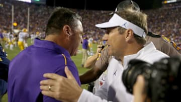 LSU Tigers head coach Ed Orgeron shakes hands with Florida Gators head coach Dan Mullen at the end of their game against the Florida Gators at Tiger Stadium. Mandatory Credit: Chuck Cook-USA TODAY Sports