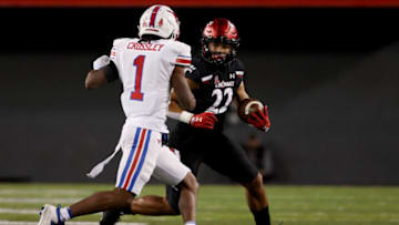 Ryan Montgomery of the Cincinnati Bearcats runs against the SMU Mustangs. Getty Images.