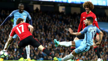 MANCHESTER, ENGLAND - APRIL 27: Sergio Aguero of Manchester City takes a shot on goal during the Premier League match between Manchester City and Manchester United at Etihad Stadium on April 27, 2017 in Manchester, England. (Photo by Clive Brunskill/Getty Images)
