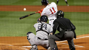 Sep 18, 2020; Boston, Massachusetts, USA; Boston Red Sox third baseman Rafael Devers (11) swings against the New York Yankees during the first inning at Fenway Park. Mandatory Credit: Winslow Townson-USA TODAY Sports