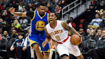 Feb 22, 2016; Atlanta, GA, USA; Atlanta Hawks guard Jeff Teague (0) dribbles past Golden State Warriors guard Leandro Barbosa (19) during the second half at Philips Arena. The Warriors defeated the Hawks 102-92. Mandatory Credit: Dale Zanine-USA TODAY Sports