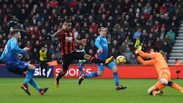 BOURNEMOUTH, ENGLAND - JANUARY 14: Callum Wilson of AFC Bournemouth scores his sides first goal during the Premier League match between AFC Bournemouth and Arsenal at Vitality Stadium on January 14, 2018 in Bournemouth, England. (Photo by Mike Hewitt/Getty Images)