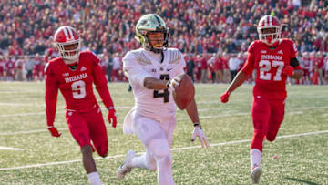 BLOOMINGTON, IN - NOVEMBER 24: Rondale Moore #4 of the Purdue Boilermakers runs the ball into the end zone during the game against the Indiana Hoosiers at Memorial Stadium on November 24, 2018 in Bloomington, Indiana. (Photo by Michael Hickey/Getty Images)