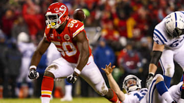 KANSAS CITY, MO - JANUARY 12: Andrew Luck #12 of the Indianapolis Colts tosses the ball after being sacked by Justin Houston #50 of the Kansas City Chiefs during the third quarter of the AFC Divisional Round playoff game at Arrowhead Stadium on January 12, 2019 in Kansas City, Missouri. (Photo by Jamie Squire/Getty Images)