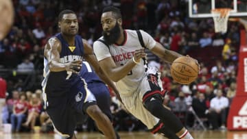 Nov 25, 2015; Houston, TX, USA; Houston Rockets guard James Harden (13) moves the ball as Memphis Grizzlies forward Tony Allen (9) defends during the first quarter at Toyota Center. Mandatory Credit: Troy Taormina-USA TODAY Sports