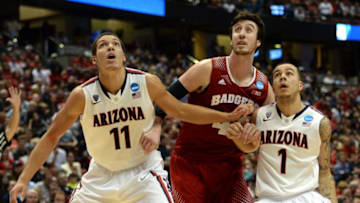 ANAHEIM, CA - MARCH 29: Aaron Gordon #11 and Gabe York #1 of the Arizona Wildcats box out Frank Kaminsky #44 of the Wisconsin Badgers in the second half during the West Regional Final of the 2014 NCAA Men's Basketball Tournament at the Honda Center on March 29, 2014 in Anaheim, California. (Photo by Harry How/Getty Images)