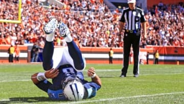 Sep 20, 2015; Cleveland, OH, USA; Tennessee Titans quarterback Marcus Mariota (8) gets up after being tackled during the first quarter against the Cleveland Browns at FirstEnergy Stadium. Mandatory Credit: Andrew Weber-USA TODAY Sports